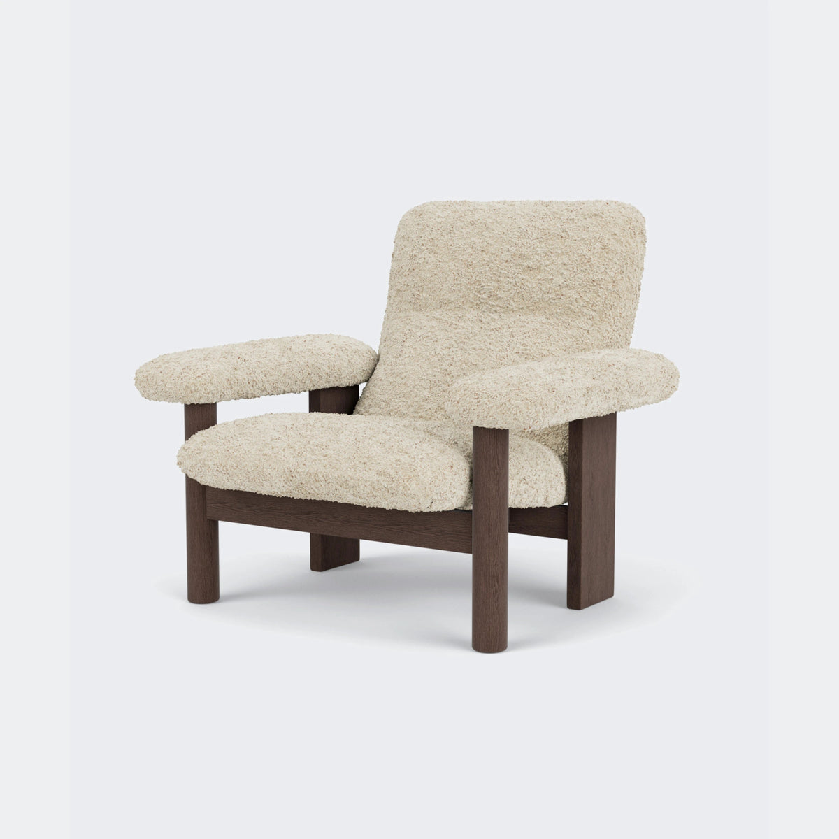 Audo Copenhagen Brasilia Lounge Chair Dark Stained Oak Sheepskin Nature